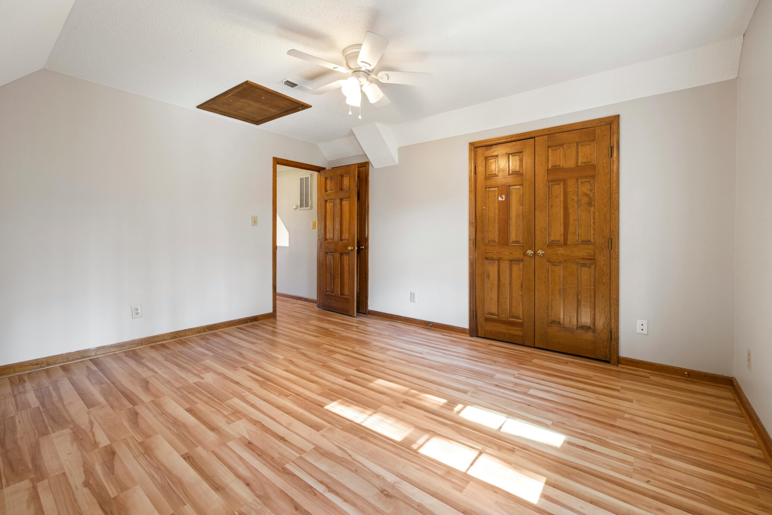 Wooden flooring installation in a home by K2 Curtains Al Shamkha